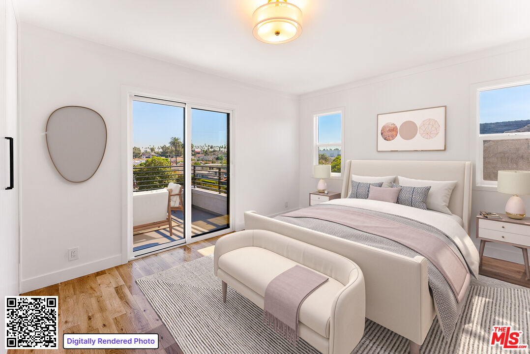 1253 South Rimpau Boulevard Los Angeles, CA 90019 - Photo 10 of 71 a bedroom with a bed and a window