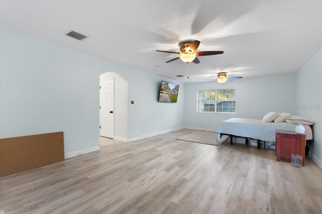 5609 Northwest 53 Court Gainesville, FL 32653 - Photo 18 of 49 a view of livingroom with furniture and wooden floor