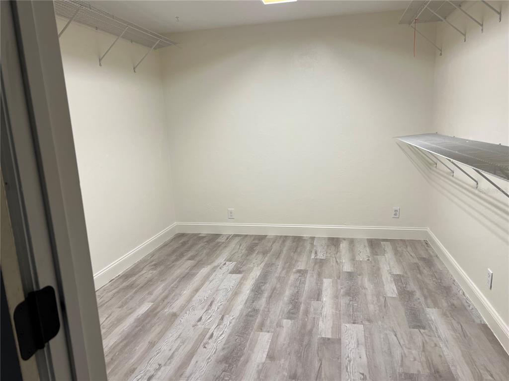 5609 Northwest 53 Court Gainesville, FL 32653 - Photo 20 of 49 a view of a room with wooden floor