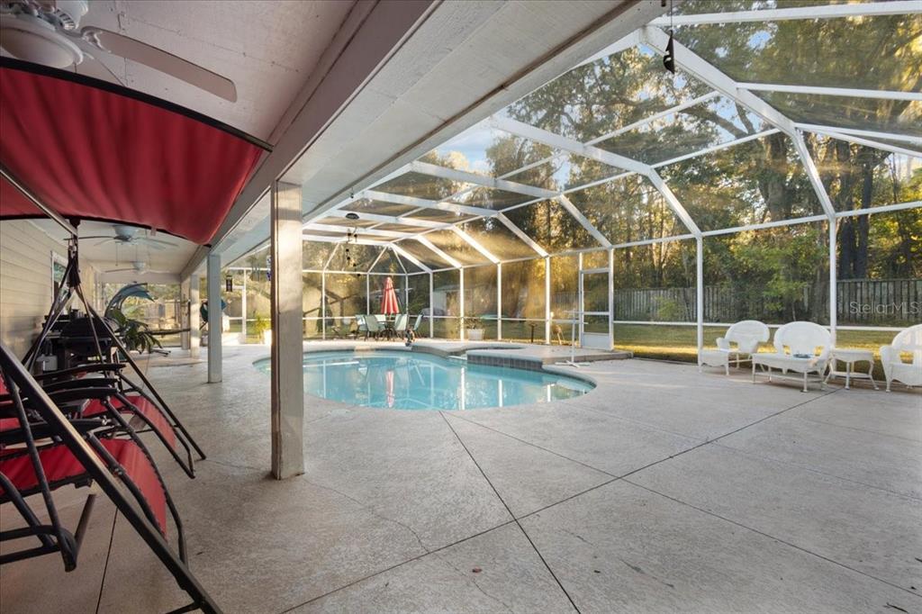 5609 Northwest 53 Court Gainesville, FL 32653 - Photo 40 of 49 a view of a balcony with chairs