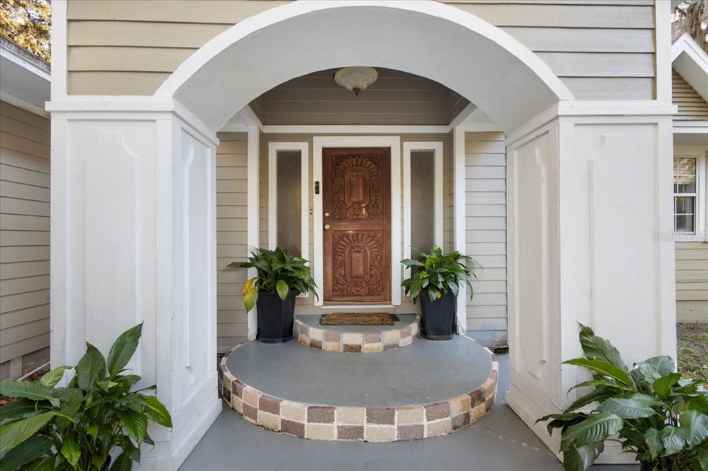 5609 Northwest 53 Court Gainesville, FL 32653 - Photo 7 of 49 a view of a entryway door front of house