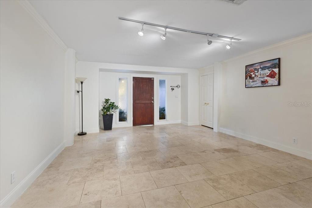 5609 Northwest 53 Court Gainesville, FL 32653 - Photo 9 of 49 a view of a big room with closet and windows