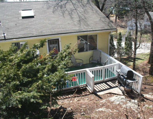 53 Upland Road West Arlington, MA 02474 - Photo 11 of 11 a view of a chair and table in the balcony