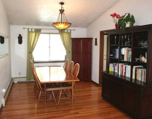 53 Upland Road West Arlington, MA 02474 - Photo 5 of 11 a dining room with furniture window and wooden floor