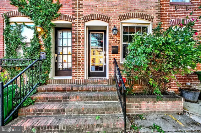 a front view of a house with a porch