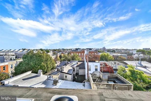 a view of a balcony with city view