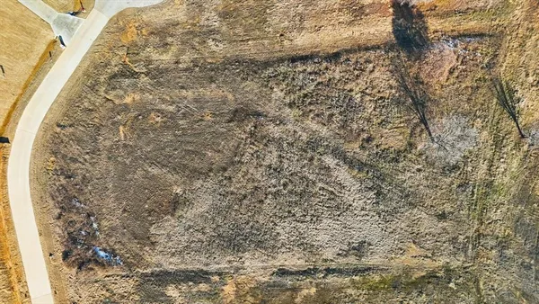 a view of yard covered with snow