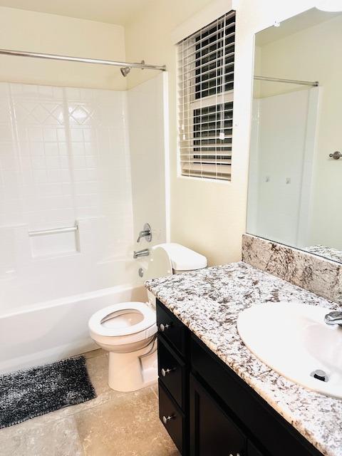 3762 Amity Lane Clovis, CA 93619 - Photo 13 of 15 a bathroom with a granite countertop sink toilet and shower