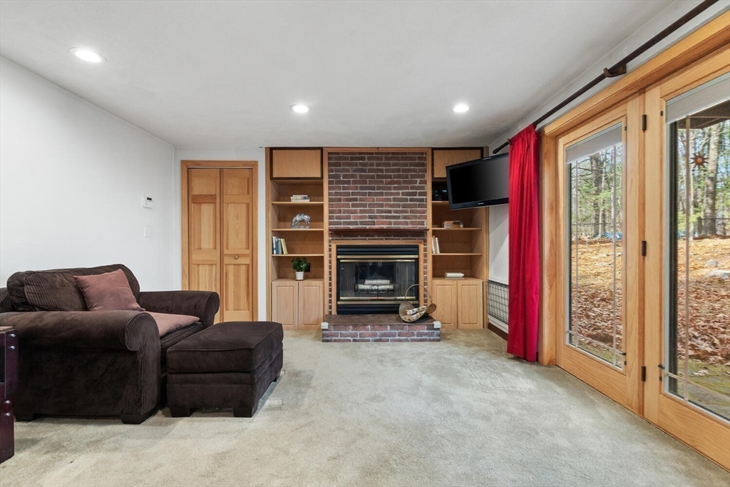 13 Dix Road Ipswich, MA 01938 - Photo 12 of 30 a living room with furniture and a fireplace
