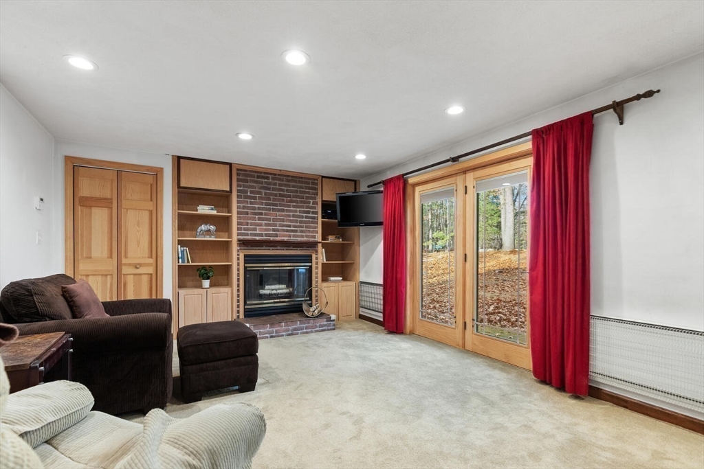 13 Dix Road Ipswich, MA 01938 - Photo 13 of 30 a living room with furniture and a flat screen tv
