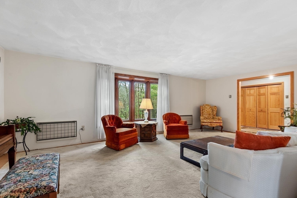 13 Dix Road Ipswich, MA 01938 - Photo 16 of 30 a living room with furniture and a window