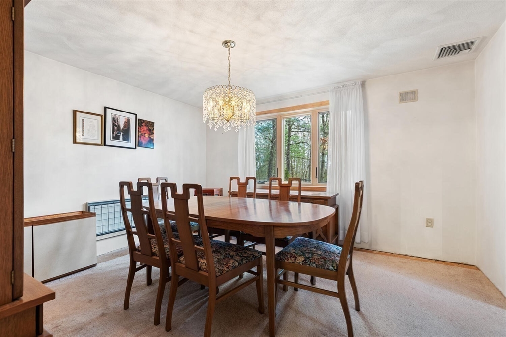 13 Dix Road Ipswich, MA 01938 - Photo 18 of 30 a view of a dining room with furniture window and outside view