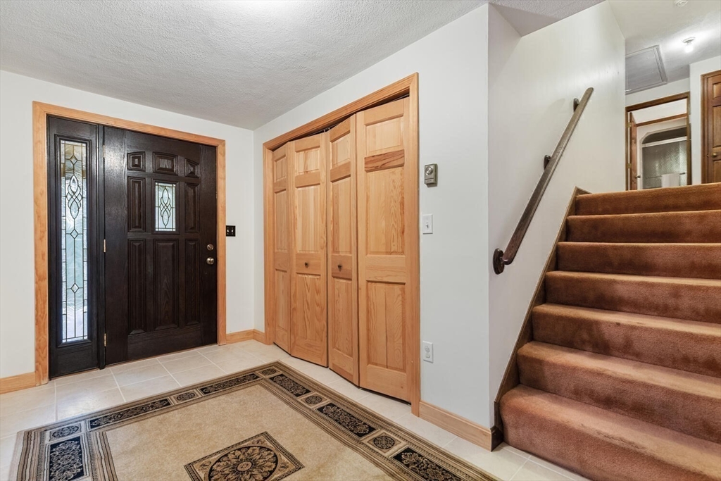 13 Dix Road Ipswich, MA 01938 - Photo 19 of 30 a view of an entryway with staircase