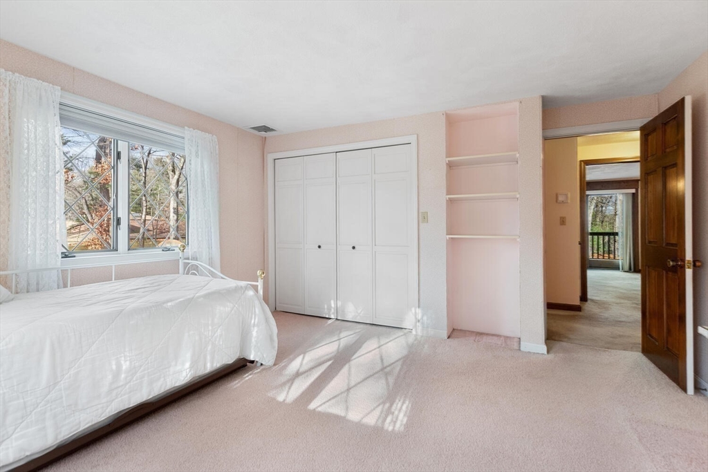 13 Dix Road Ipswich, MA 01938 - Photo 23 of 30 a bedroom with a bed and a window