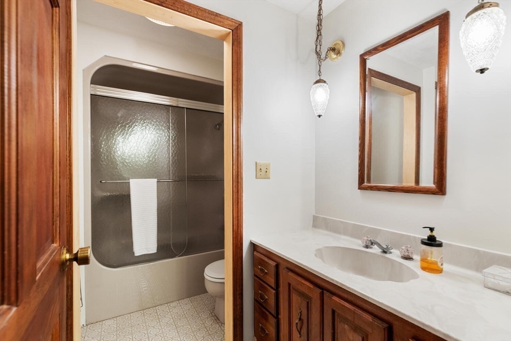 13 Dix Road Ipswich, MA 01938 - Photo 25 of 30 a bathroom with a sink a toilet and shower