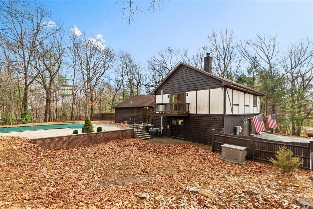 13 Dix Road Ipswich, MA 01938 - Photo 6 of 30 a front view of a house with a yard