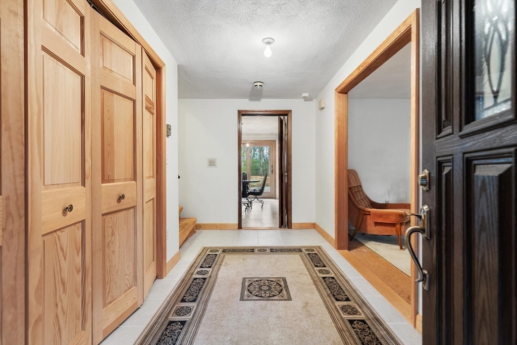 13 Dix Road Ipswich, MA 01938 - Photo 7 of 30 a view of a hallway with windows