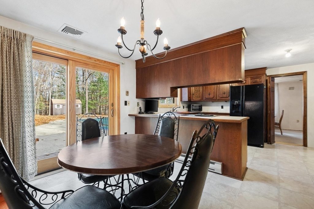 13 Dix Road Ipswich, MA 01938 - Photo 9 of 30 a view of a dining room with furniture window and outside view