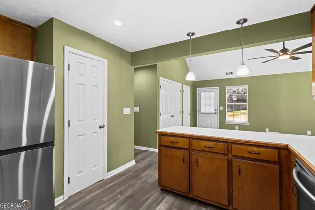 a kitchen with a sink and a window