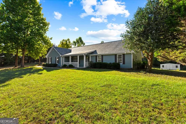 a house with trees in front of it