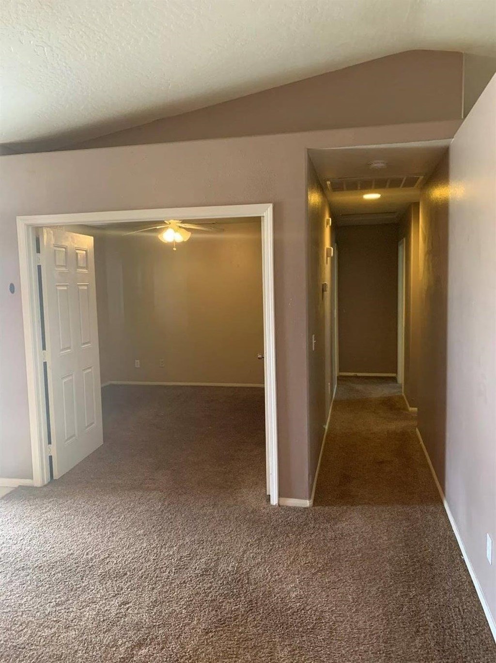 15006 Temecula Road Apple Valley, CA 92307 - Photo 4 of 13 en empty room with windows