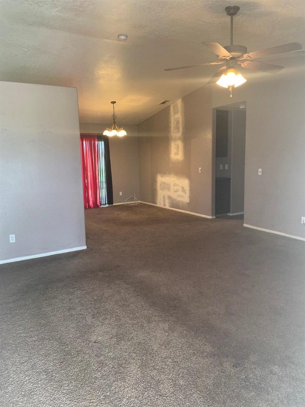 15006 Temecula Road Apple Valley, CA 92307 - Photo 9 of 13 a view of a room with painted walls
