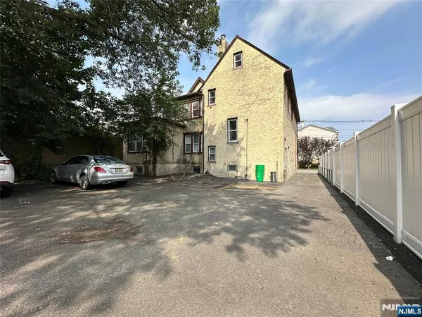 a view of car parked in front of house