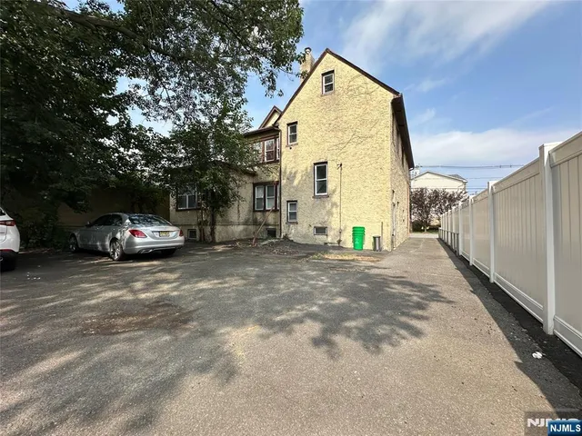a view of car parked in front of house