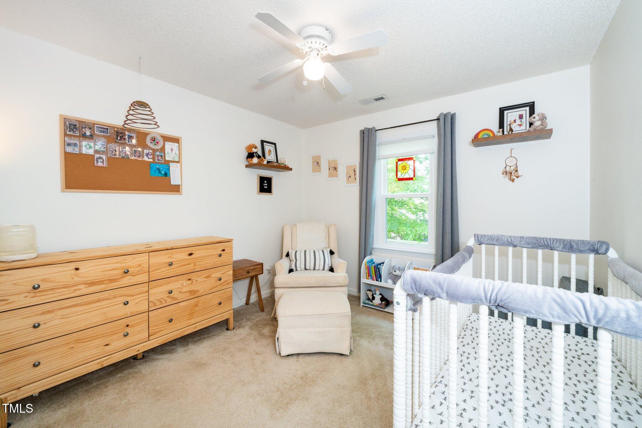 8009 Tobin Place Raleigh, NC 27612 - Photo 21 of 29 Rear Bedroom