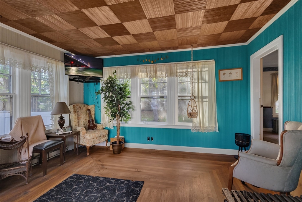 22 Williams Street Dudley, MA 01571 - Photo 12 of 33 a living room with furniture and a large window