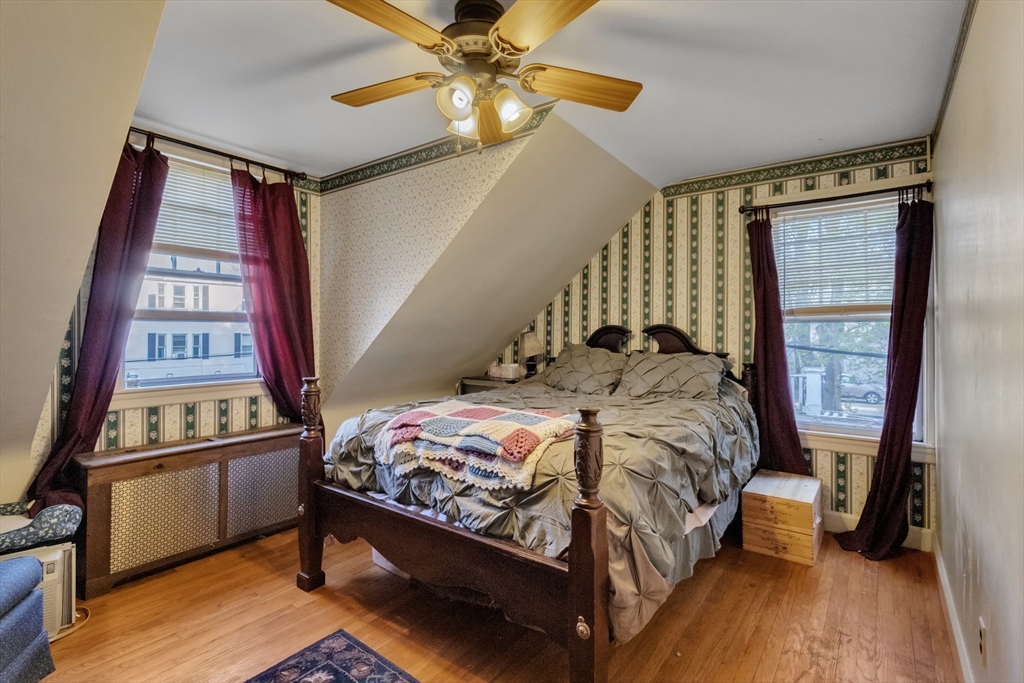 22 Williams Street Dudley, MA 01571 - Photo 22 of 33 a bedroom with a bed and a window