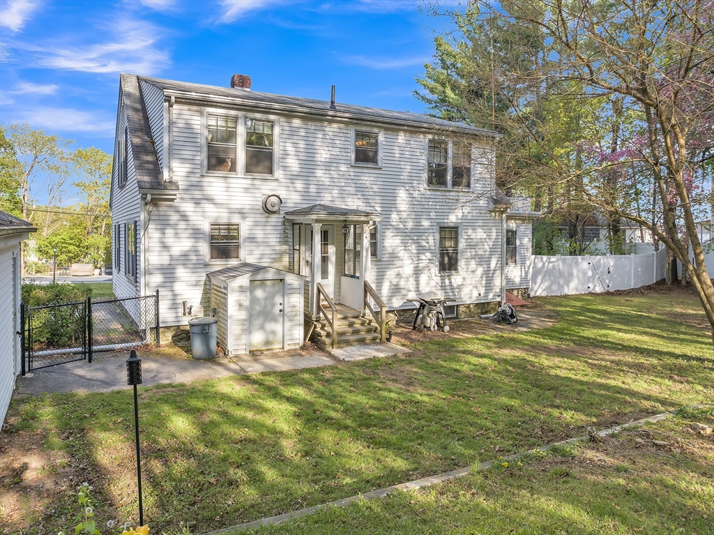 22 Williams Street Dudley, MA 01571 - Photo 28 of 33 a front view of a house with swimming pool