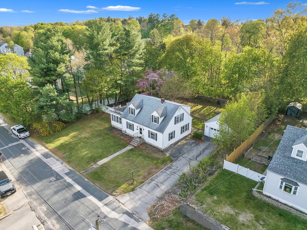22 Williams Street Dudley, MA 01571 - Photo 3 of 33 a view of a two chairs in a yard