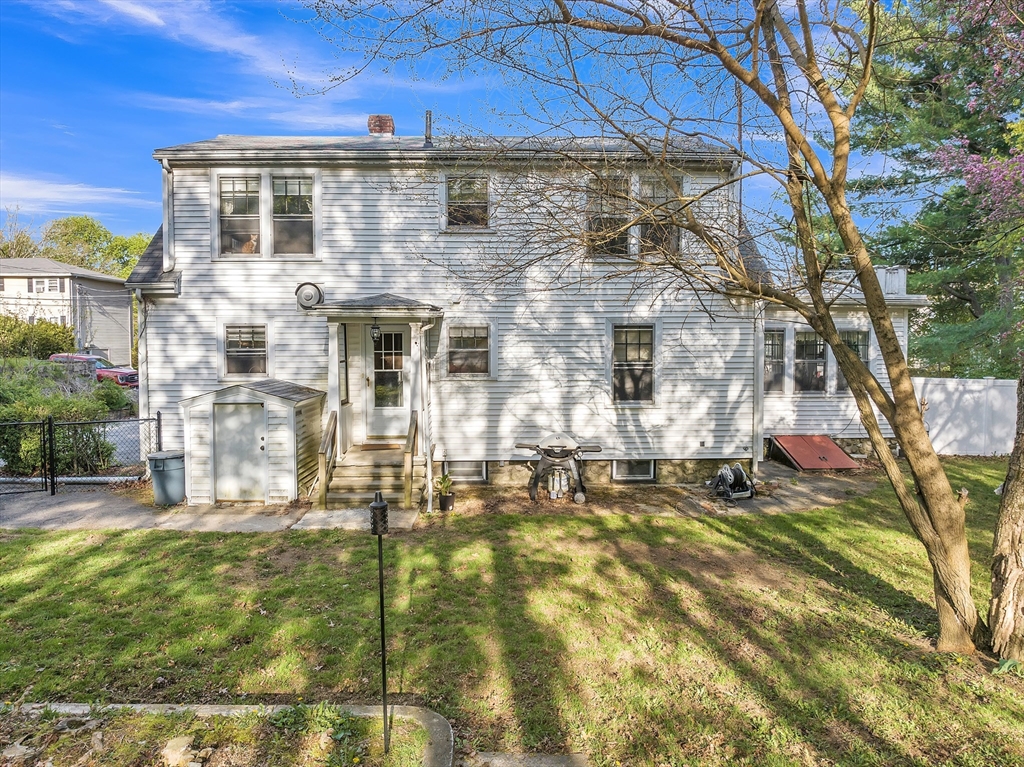22 Williams Street Dudley, MA 01571 - Photo 6 of 33 a front view of a house with a yard