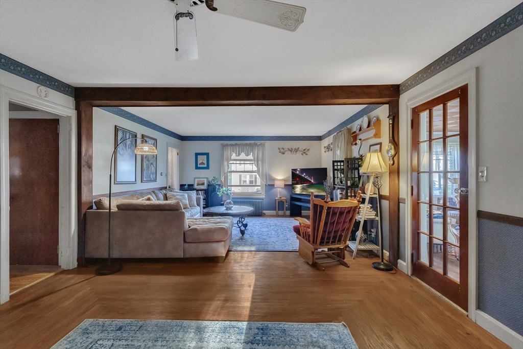 22 Williams Street Dudley, MA 01571 - Photo 8 of 33 a view of a livingroom with furniture and a flat screen tv