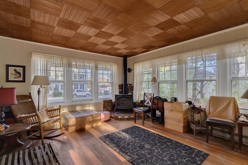 22 Williams Street Dudley, MA 01571 - Photo 10 of 33 a living room with furniture and a wooden floor