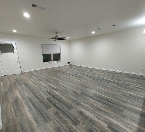 814 Chestnut Street Bonham, TX 75418 - Photo 3 of 12 a view of an empty room with a fireplace