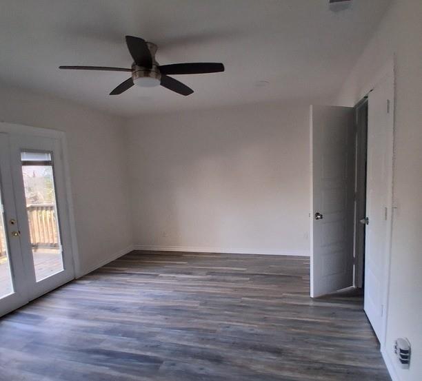 814 Chestnut Street Bonham, TX 75418 - Photo 4 of 12 a view of an empty room with wooden floor and a window