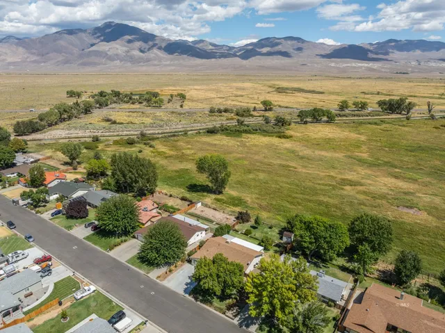 a view of a garden with an outdoor space