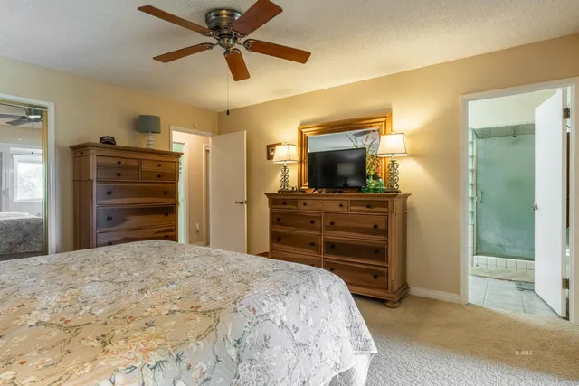 a bedroom with a bed and furniture