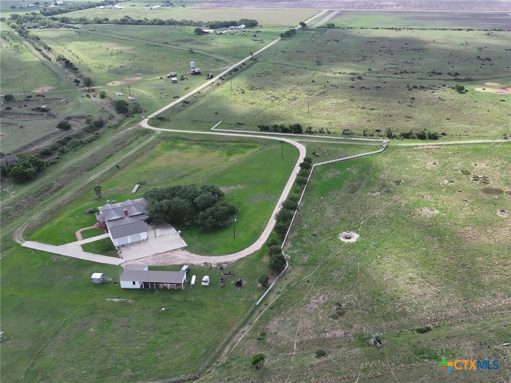 257 Whitaker Road Port Lavaca, TX 77979 - Photo 3 of 37 a view of a lake with a yard