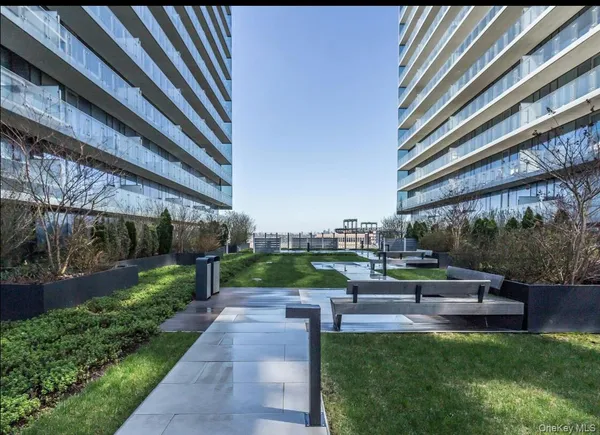 a garden view with a seating space