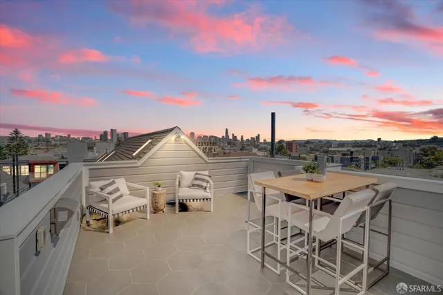 a view of a terrace with furniture