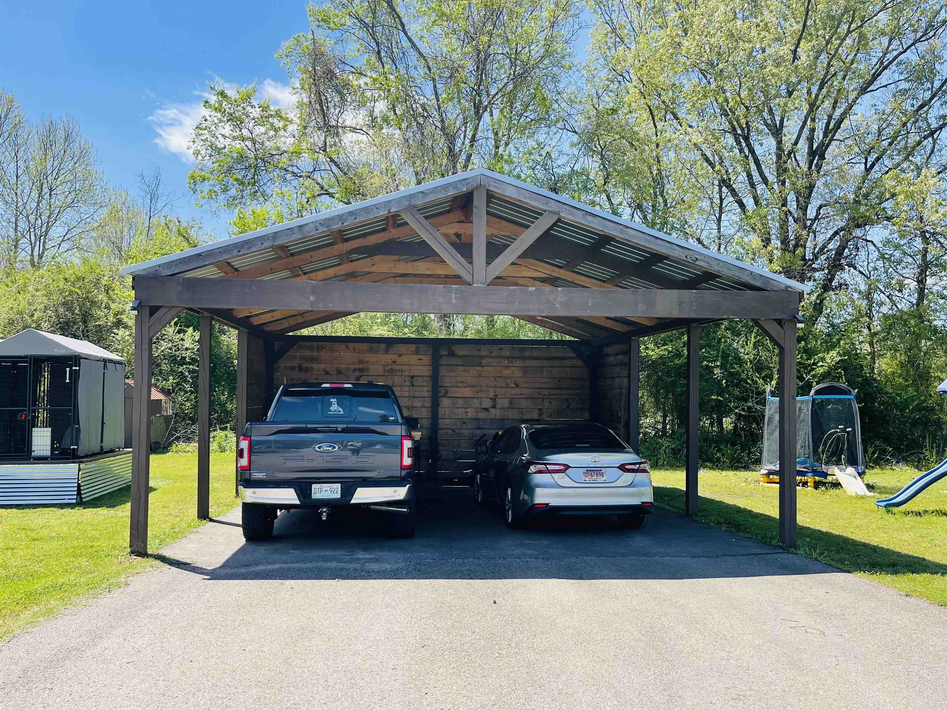 207 Chris Lane Ramer, TN 38367 - Photo 12 of 15 a car parked in front of house with a yard