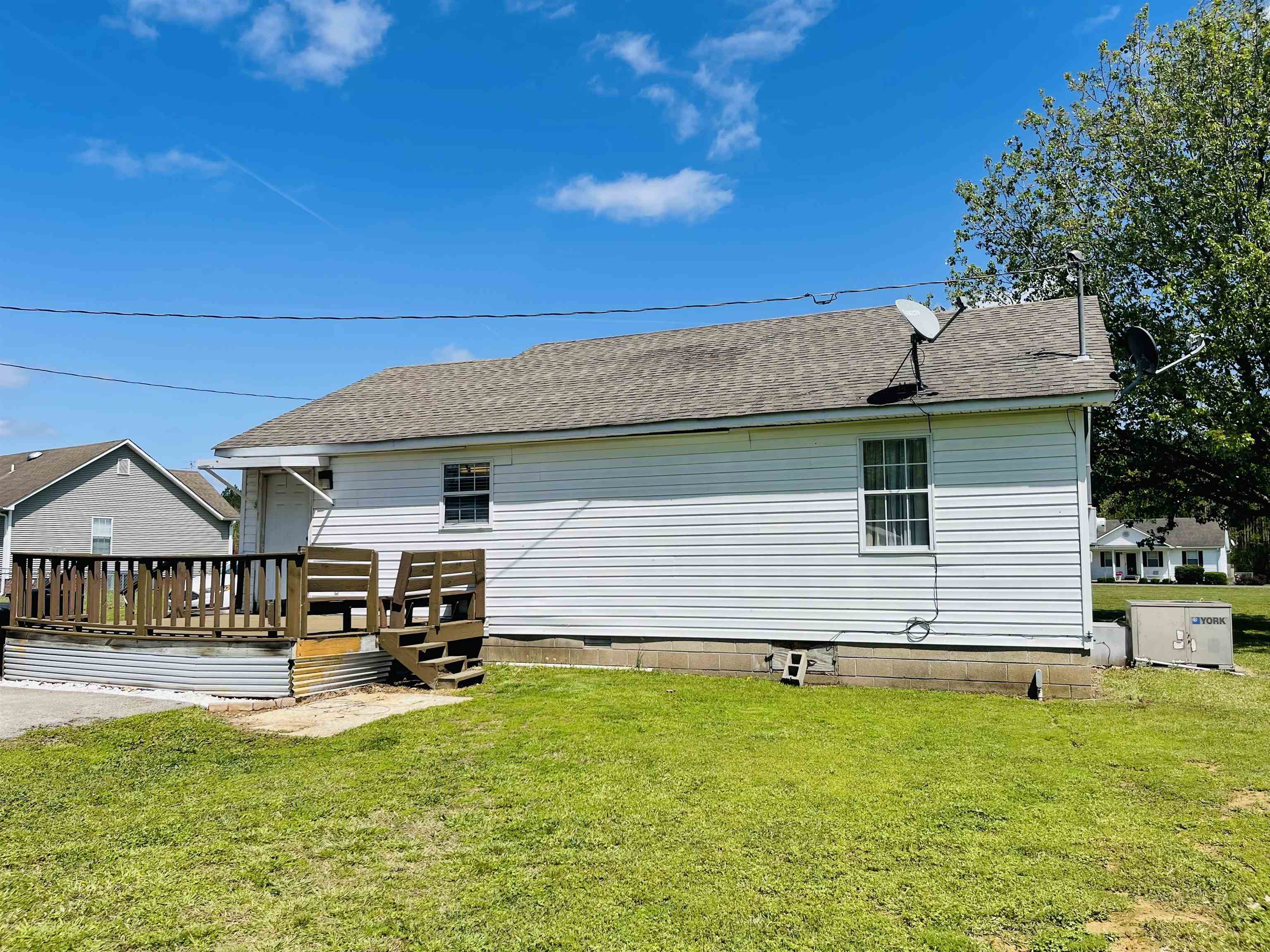 207 Chris Lane Ramer, TN 38367 - Photo 13 of 15 a view of a house with a backyard