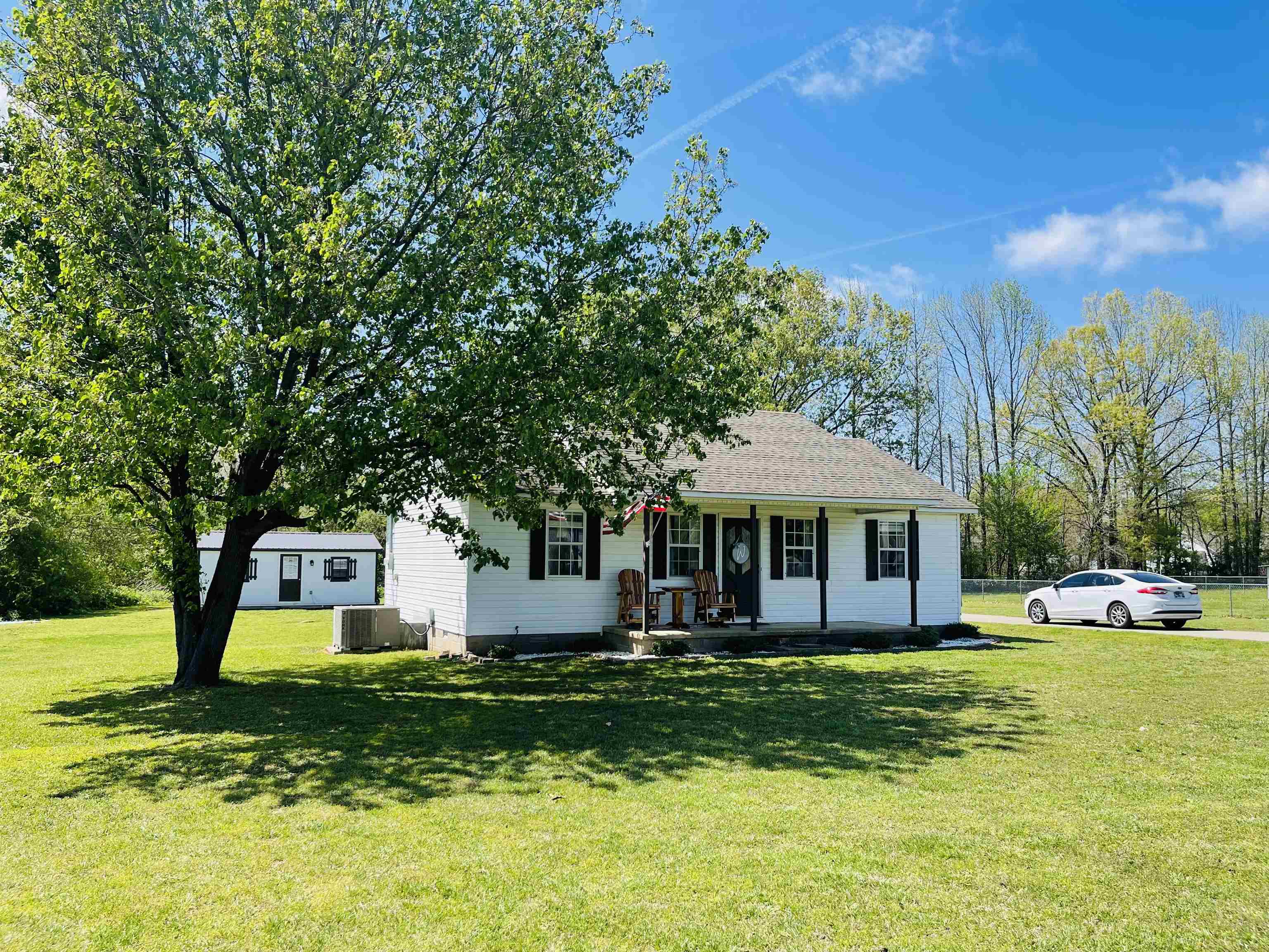 207 Chris Lane Ramer, TN 38367 - Photo 15 of 15 a front view of a house with yard and green space