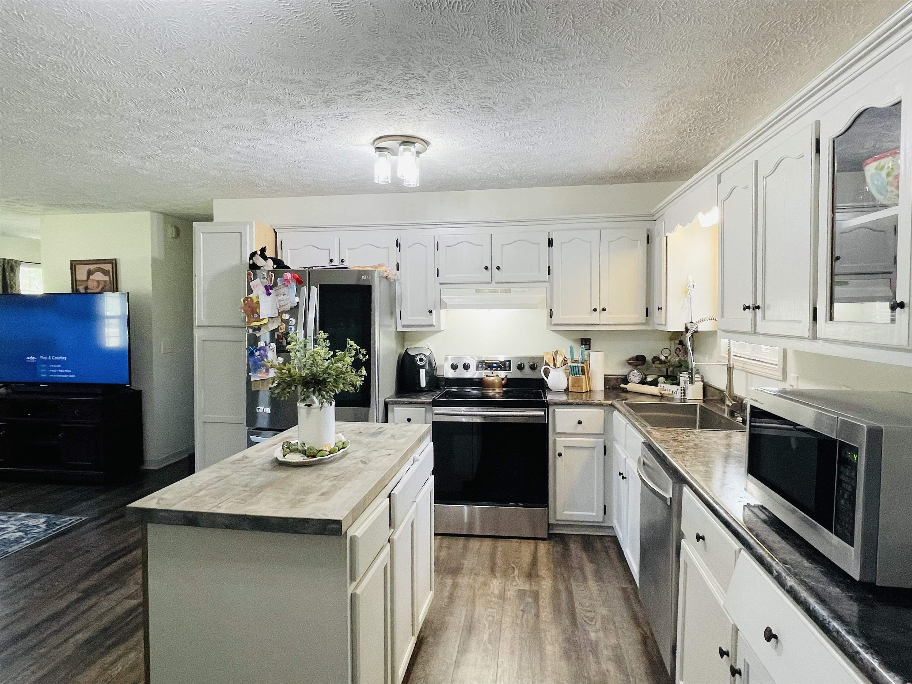 207 Chris Lane Ramer, TN 38367 - Photo 5 of 15 a kitchen with a sink stove and cabinets