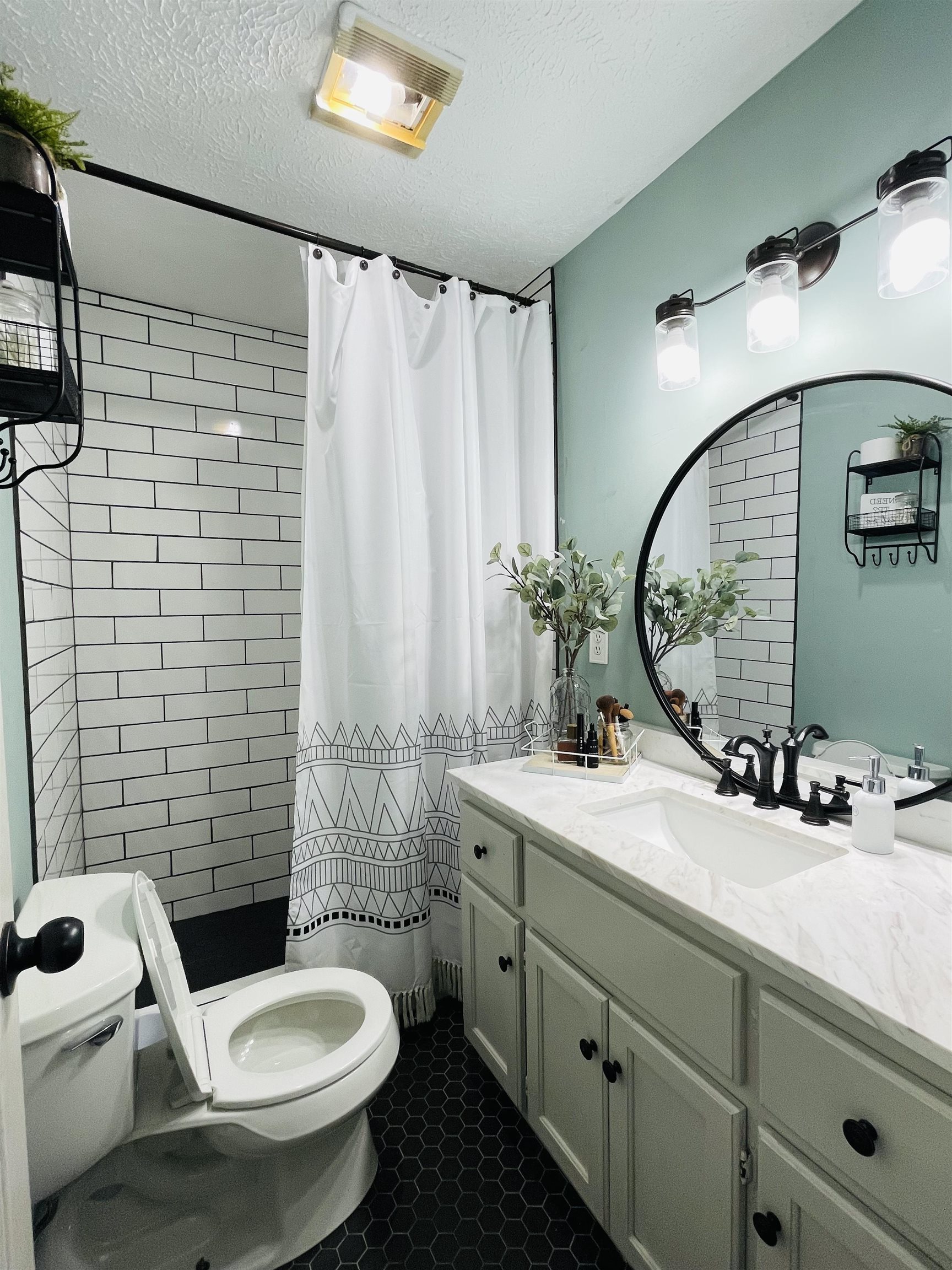 207 Chris Lane Ramer, TN 38367 - Photo 9 of 15 a bathroom with a toilet sink and mirror