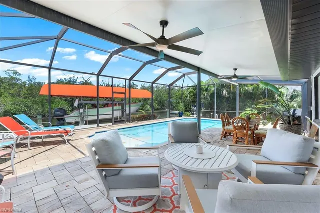 a outdoor space with patio the couches and a dining table with the view of garden