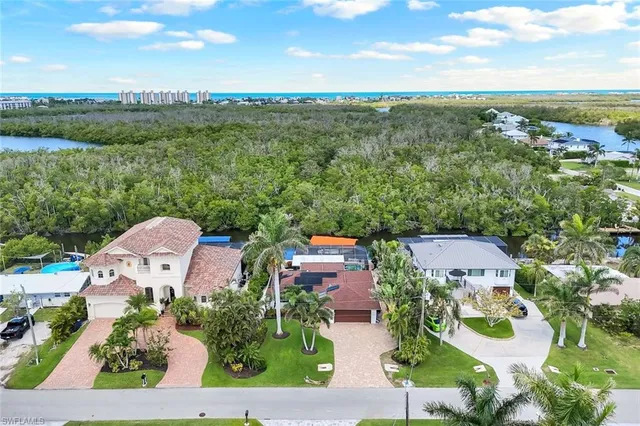 an aerial view of a house with a garden